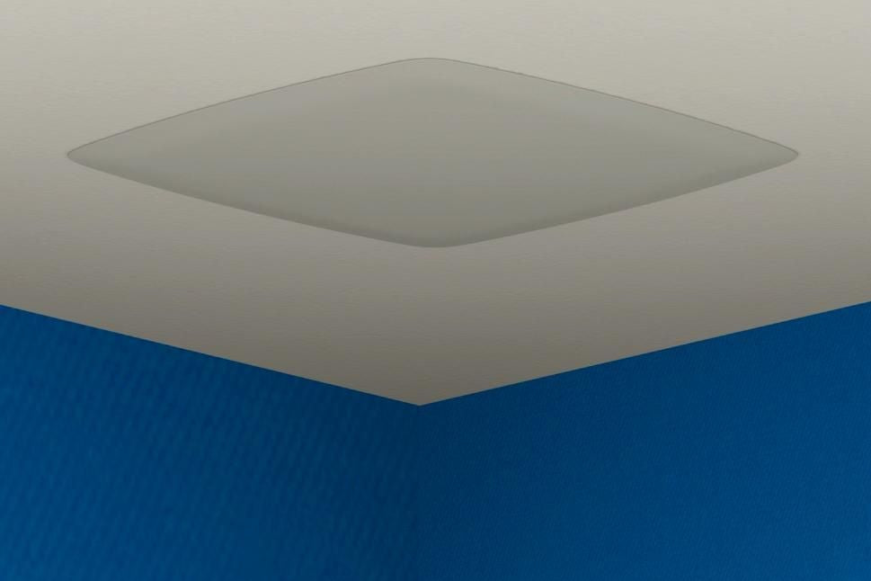 Hide all your small electronics in-ceiling and get this clean paintable flush cover.